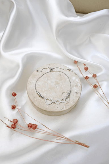 PULSERA CLEO JOYAS & ACCESORIOS CORAZON INFINITO REGULABLE PLATEADO PLATA