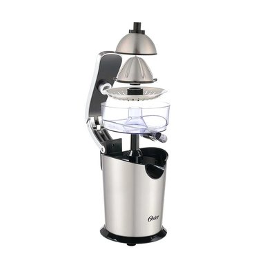 EXPRIMIDOR DE CITRICOS OSTER DE ACERO INOXIDABLE FPSTJU4200 - 5