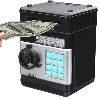 ALCANCIA CAJA FUERTE ELECTRONICA DE MONEDAS Y BILLETES - COLOR HOMBRE