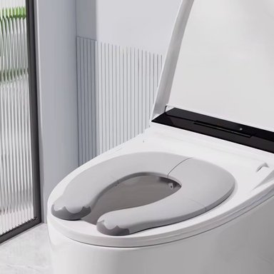 ADAPTADOR INODORO PARA NIÑO PLEGABLE GRIS