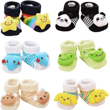 PACK DE 3 MEDIAS ANTIDESLIZANTES PARA BEBES CON MUÑECO PARA BEBÉS