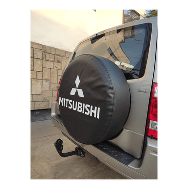 COBERTOR LLANTA DE REPUESTO MITSUBISHI MONTERO S M - 4