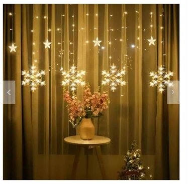 CORTINA LUCES AMBAR NAVIDAD CON COPO NIEVE