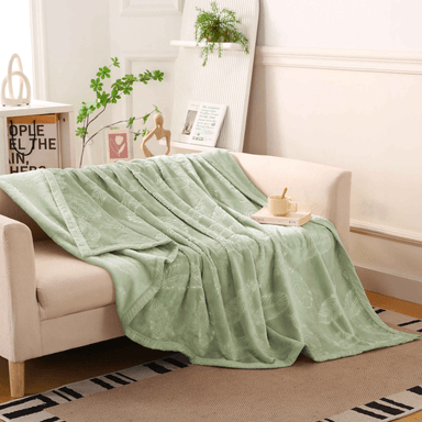 MANTA CON ALTO RELIEVE CON DISEÑO DE HOJAS