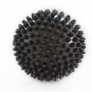 PELOTA ERIZO PLÁSTICO DURO MASAJEADOR 7 CM - NEGRO