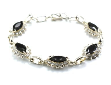 PULSERA RELISE PLATA LEY 950 CON ZIRCONES NEGRO FACETADO OVALADO EVY 1 - 2