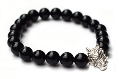 PULSERA RELISE PLATA LEY 950 ELASTICA CON PIEDRA NATURAL ONIX Y DIJE CABEZA LOBO