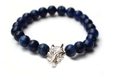 PULSERA RELISE PLATA LEY 950 ELASTICA CON PIEDRA NATURAL LAPIZLAZULI Y DIJE CABEZA LOBO