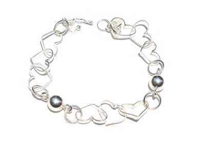 PULSERA RELISE PLATA CORAZONES