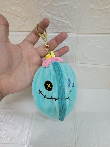 LLAVERO STITCH ENCAPSULADO - CELESTE