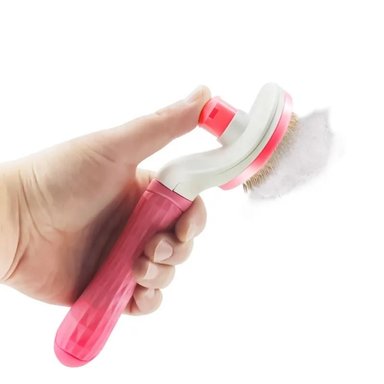 CEPILLO PARA MASCOTAS PEINE CON BOTÓN COLOR ROSADO