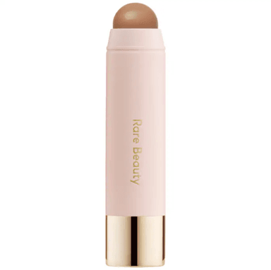 RARE BEAUTY: BRONZER STICK TONO HAPPY SOL - 1
