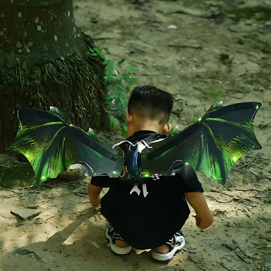 ALAS DINOSAURIO VERDE CON LUZ, SONIDO Y MOVIMIENTO