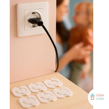 PROTECTOR DE ENCHUFE ADHESIVO
