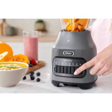 LICUADORA OSTER 6 VELOCIDADES + PULSO CON VASO DE VIDRIO BLSTPEG-GPB GRIS - 6
