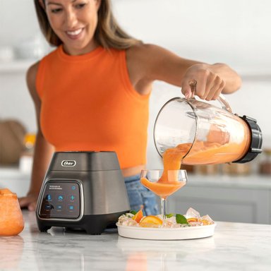 LICUADORA OSTER TACTIL CON PROGRAMAS AUTOMÁTICOS Y TECNOLOGÍA REVERSIBLE + VASO BLEND-N-GO BLSTPYG1312XBG - 11