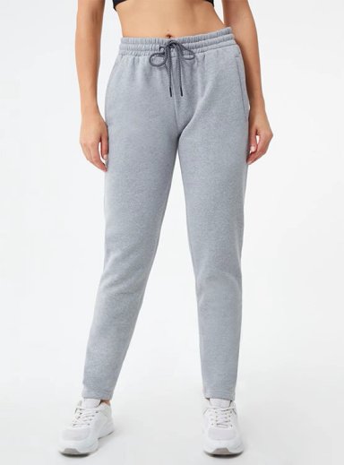 PANTALÓN DE BUZO MUJER REVUP SKINNY