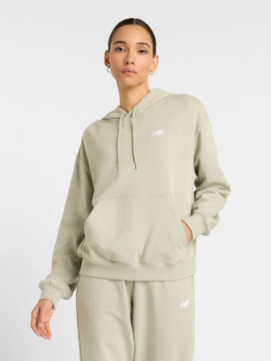 POLERA MUJER NEW BALANCE WT41507OVN BEIGE