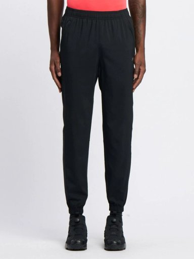 PANTALÓN BUZO HOMBRE REEBOK ID TRAIN WOVEN PANT NEGRO