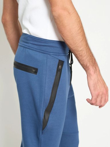 PANTALÓN BUZO HOMBRE REVUP GRIS CLARO CORTES - 2