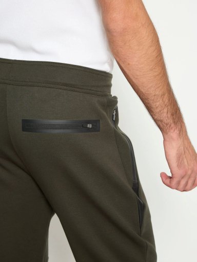 PANTALÓN BUZO HOMBRE REVUP GRIS CLARO CORTES - 2