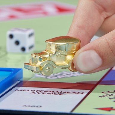 JUEGO MESA MONOPOLY EXPANSIÓN PARADA LIBRE: EL GRAN PREMIO - 11
