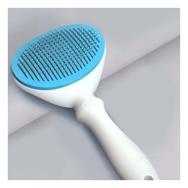 ACCESORIO REMOVEDOR DE PELUSA CELESTE Y BLANCO PARA ROPA SOFA Y TAPIZ - 2